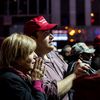 Scenes From Midtown NYC: Nervous Crowds And MAGA Hats As Electoral Votes Come In